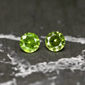 demantoid garnet pair 0.90 ct